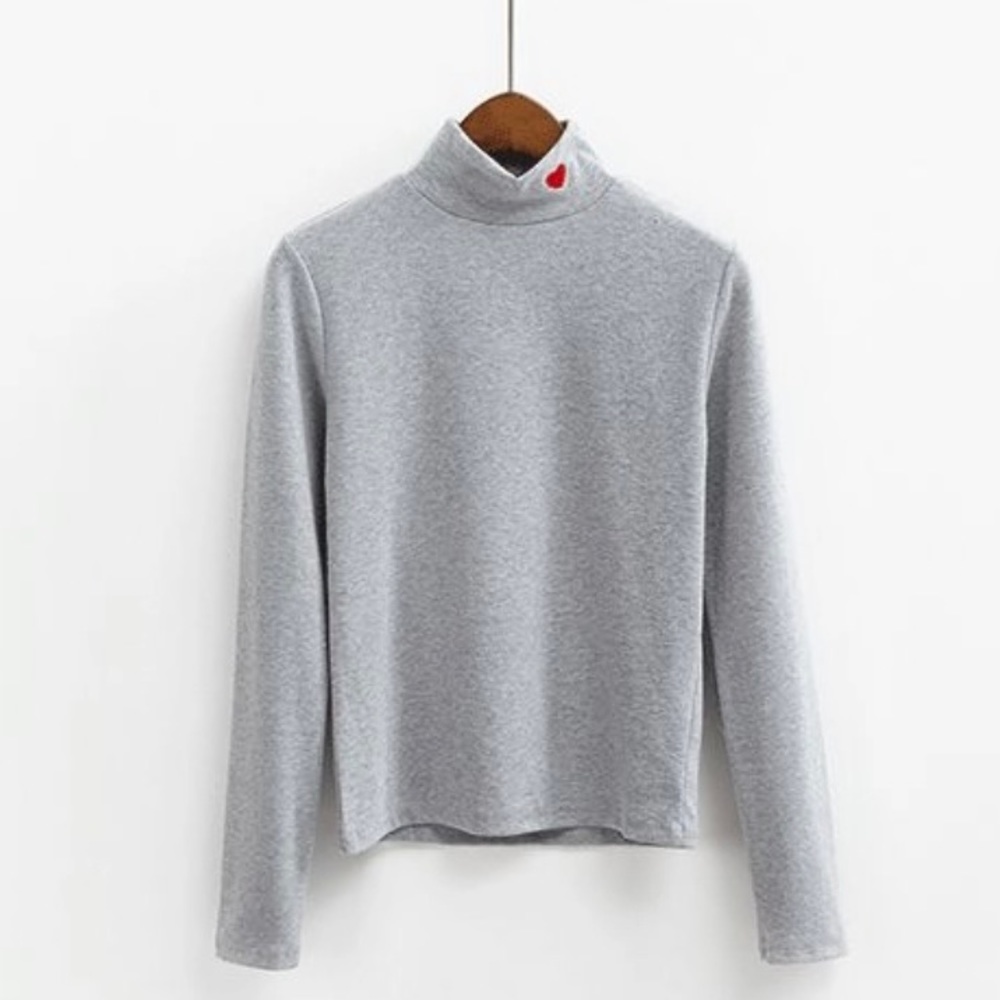 Turtleneck shirt with embroidered heart